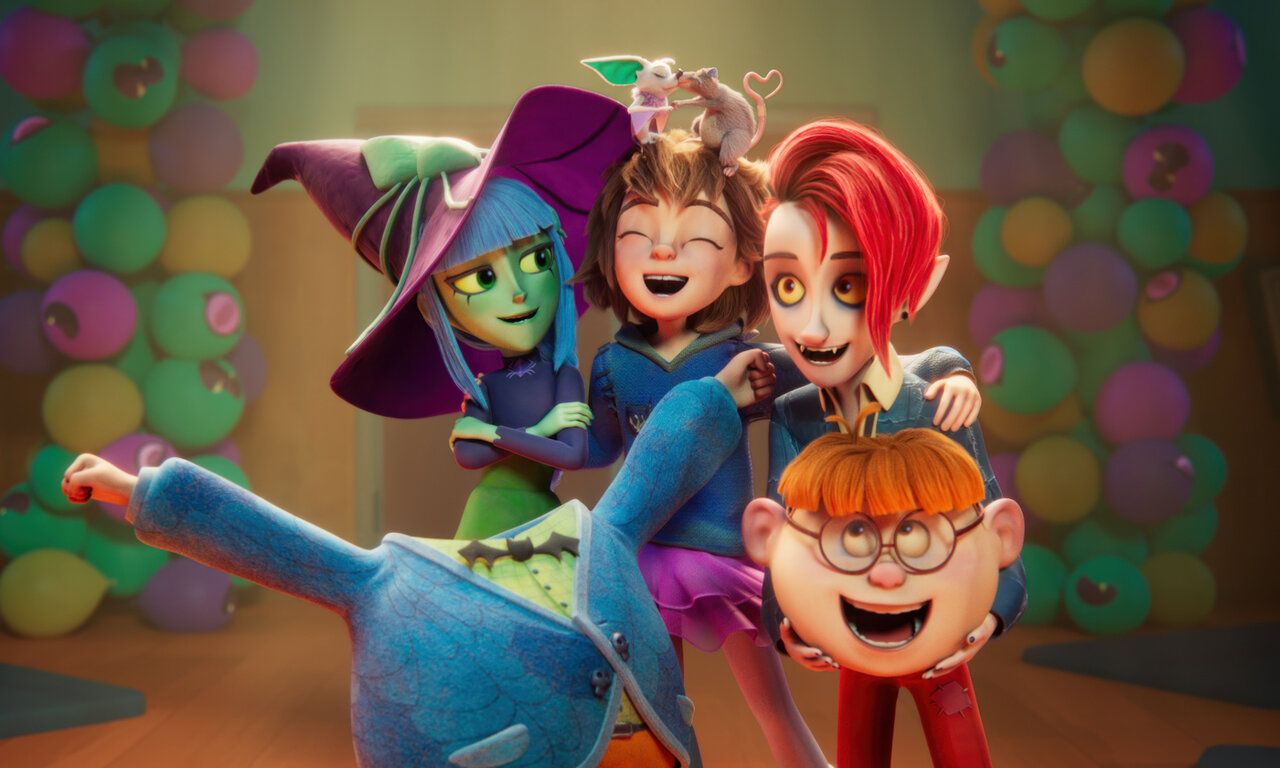Szene aus dem Animationsfilm Monster Mia, Gruppenbild von verschiedenen gruseligen Gestalten, die lachen