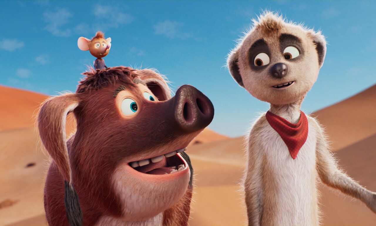 Szene aus dem Animationsfilm Tafiti Ab durch die Wüste, ein Wildschwein und ein Erdmännchen laufen durch eine Wüste, auf dem Kopf des Wildschweins sitzt eine Maus