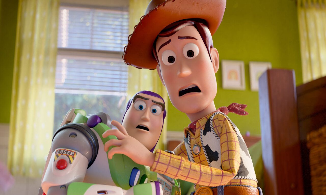 Szene aus dem Animationsfilm Toy Story, Spielzeugcowboy Woody, Weltraumactionfigur Buzz Lightyear gucken überrascht in die Kamera