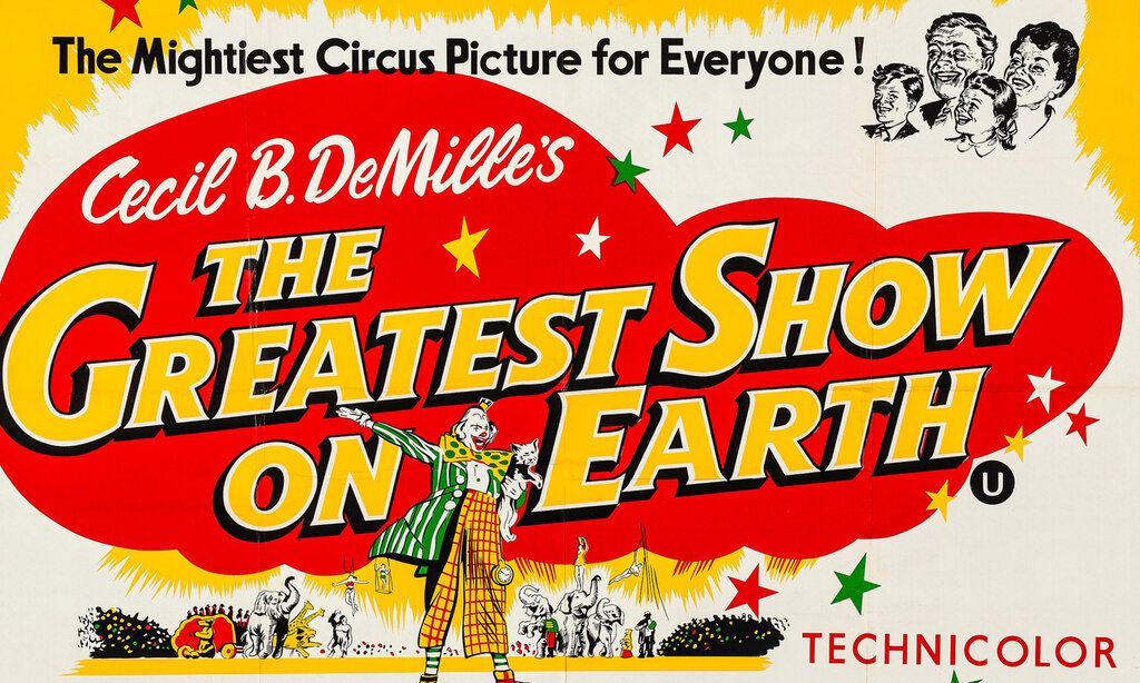 altes Filmplakat, mit Schriftzug „The greatest Show on earth“ und Illustrationen von Clown, Publikum und Zirkustieren