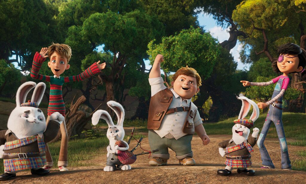 Animationsfilm, drei Kinder und drei Hasen in Schotten-Klamotten stehen vor Bäumen und strecken die geballten Fäuste in die Luft