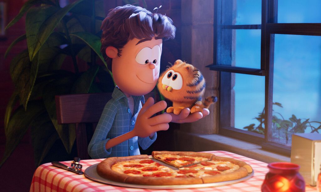 Animationsfilm, Kater Garfield mit seinem Herrchen beim Pizzaessen im Restaurant
