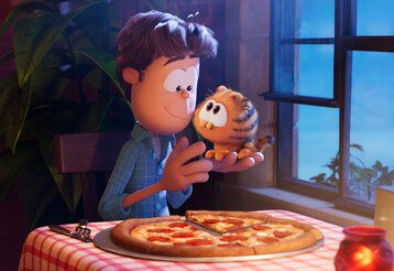 Animationsfilm, Kater Garfield mit seinem Herrchen beim Pizzaessen im Restaurant