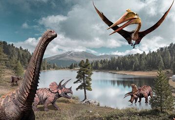 verschiedene Dinos in einer Landschaft