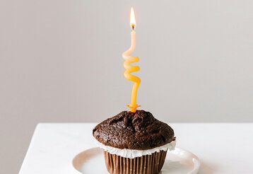 Kerze auf Muffin